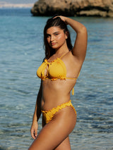 Model im Bikini gelb gerippt premium stoff Palmar siwmwear